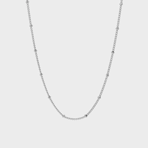 Collana minimalista in acciaio inossidabile argento con piccole perline decorative rotonde