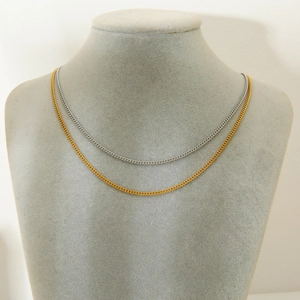 Detailed close-up of 18K gold and silver plated stainless steel O-chain necklaces