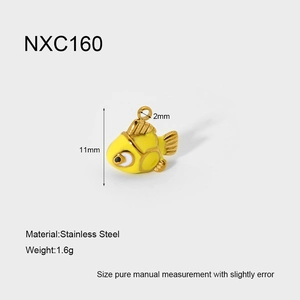 Detail view of yellow enamel fish pendant in stainless steel with 11mm dimensions