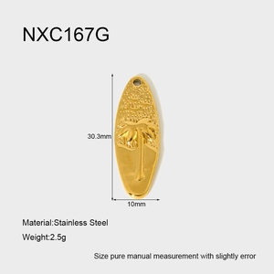Detailed view of 18K gold-plated stainless steel surfboard pendant with palm tree relief