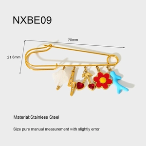 Detail view of 70mm gold stainless steel pin with colorful enamel charms for clothes