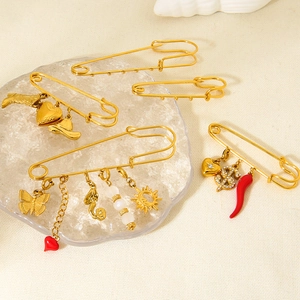 Luxury 18K gold-plated safety pin brooch with charms like heart, sun, and pearls for DIY