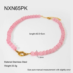 Detail of handmade necklace with 7.6mm pink cat-eye beads and stainless steel clasp