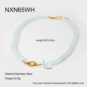 Detail view of 7.6mm light blue glass bead necklace with gold stainless steel clasp