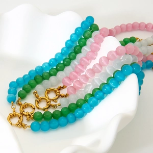 Handcrafted cat-eye glass bead necklaces in multi-colors with gold spring clasps