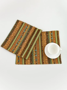 Detail of bohemian striped rectangle placemats with woven thermal insulation texture