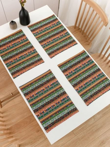 Detail of bohemian striped placemats in a four-piece set with ethnic geometric patterns