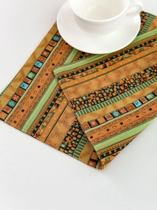 Close-up of ethnic style striped jacquard placemat with intricate woven patterns and colors
