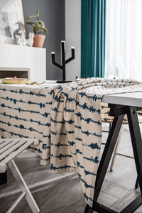 Detail of blue wavy stripe pattern on high-quality linen texture tablecloth fabric