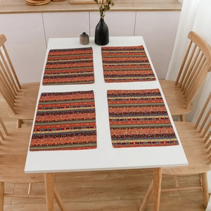 Bohemian style woven heat resistant placemats with colorful geometric stripes set of four