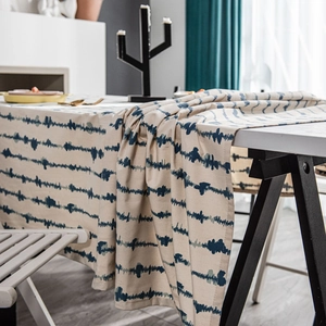 Rectangle tablecloth with blue wavy stripes on beige linen-textured fabric for home dining decor