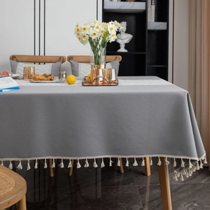 Grey American style jacquard tablecloth with white geometric patterns and tassel edges