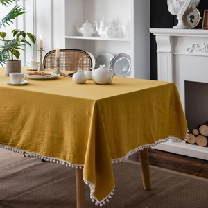 French style mustard yellow rectangular tablecloth with white pom-pom fringe edges