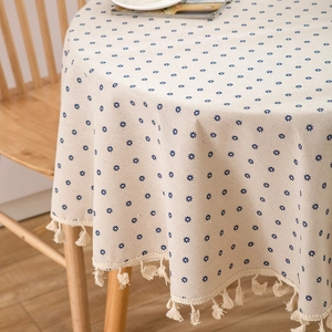 Round linen tablecloth with blue daisy floral print and elegant fringe tassels