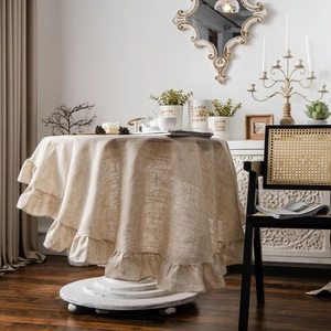 Beige round linen tablecloth with elegant double layered ruffled edges for home decor