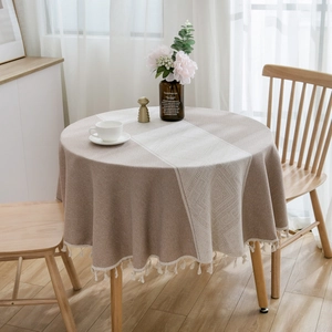 Green jacquard geometric round tablecloth with cotton fringe tassels in a Nordic style