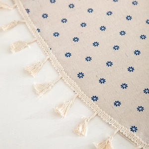 Round cotton linen tablecloth with blue floral print and fringe edges for home decor