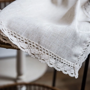 Linen semi-blackout curtain featuring elegant crochet lace border in a rustic style