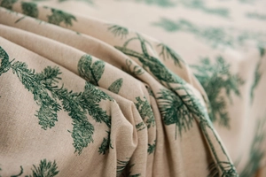 Macro detail of pine tree pattern on textured linen cotton rectangular tablecloth