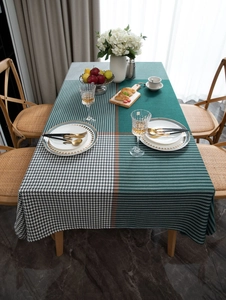 Detail of forest green and grey houndstooth patterned thickened linen tablecloth