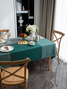 Detail of dark green houndstooth jacquard tablecloth with premium woven texture