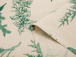 Detail of pine branch print on linen texture fabric with elegant natural beige drape