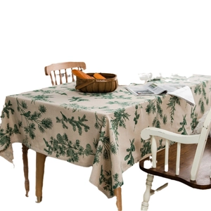 Linen rectangular tablecloth featuring green pine tree prints and bird patterns in forest style