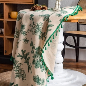 Green pine needle print cotton linen tablecloth with fringe tassels on round table