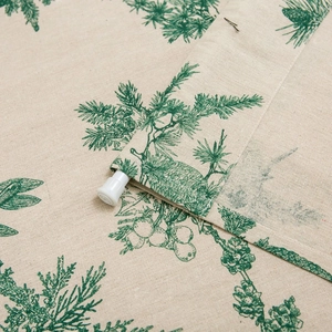 Green pine branch print door curtain in cotton linen with rod pocket design detail