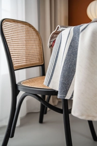 Close-up of high-quality linen cotton tablecloth with navy blue striped patterns and textures