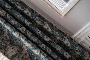 Detail view of American style floral curtain with blue oil painting pattern and lace trim