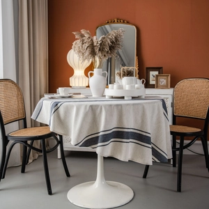 Round navy blue striped cotton linen tablecloth in minimalist Nordic style for dining tables