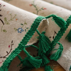 Floral cotton linen tablecloth with green tassel trim in a fresh pastoral style