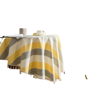 Yellow and grey striped table cloth with cream tassels for round or rectangular dining tables