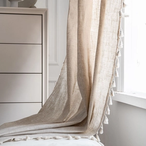 Linen blend semi-blackout curtain in wood color with elegant white tassels for windows