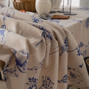 Linen table cloth with blue floral print and rustic dinner set for elegant home dining