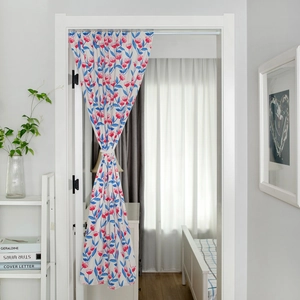 Detail of pink tulip floral print on cream fabric door curtain in a bedroom setting