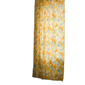 Floral print semi-blackout curtains in yellow and orange tones for kitchens