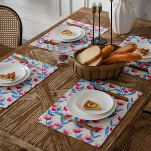 Floral print rectangular cotton linen placemats set of 4 on a rustic wooden dining table