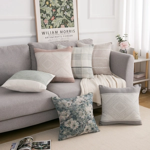 Detail of Nordic geometric cushion covers with cotton linen texture and jacquard patterns