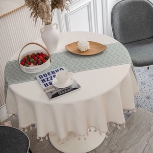 Modern geometric jacquard round tablecloth with tassel fringe and elegant patterns