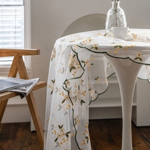 Lace tablecloth with yellow floral embroidery and green scalloped edges for home decor