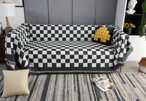 Nahaufnahme des dicken Schachbrettmusters mit dekorativen Quastendetails am Rand