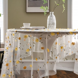 White lace tablecloth with yellow floral embroidery for photography backdrop and home decor