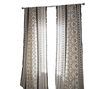 Bohemian black and white geometric print cotton linen curtains with tassel trim set of 2