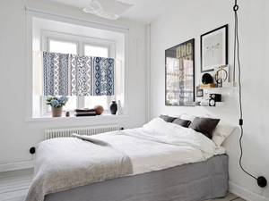Detailed blue and white bohemian geometric floral pattern on linen kitchen cafe curtain