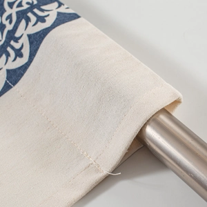 Detail of rod pocket and blue floral pattern on durable cotton linen cafe curtain