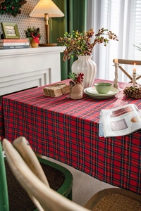 Close-up of red and blue checkered tablecloth with classic tartan weave and thick texture