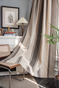 Detailed texture of American style striped cotton linen curtain fabric in beige and brown