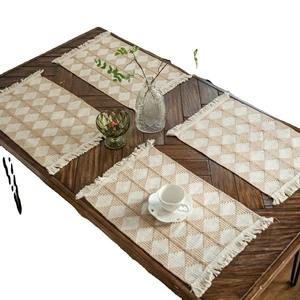 Set of 4 woven cotton table mats with geometric diamond pattern and fringe tassels
